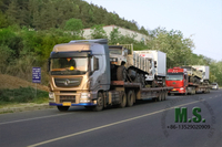 //imrorwxhonmplr5p-static.micyjz.com/cloud/lrBpiKoklrSRjlikpmojjq/Chinese-tractor-truck-carrying-the-truck-to-ship-out.jpg